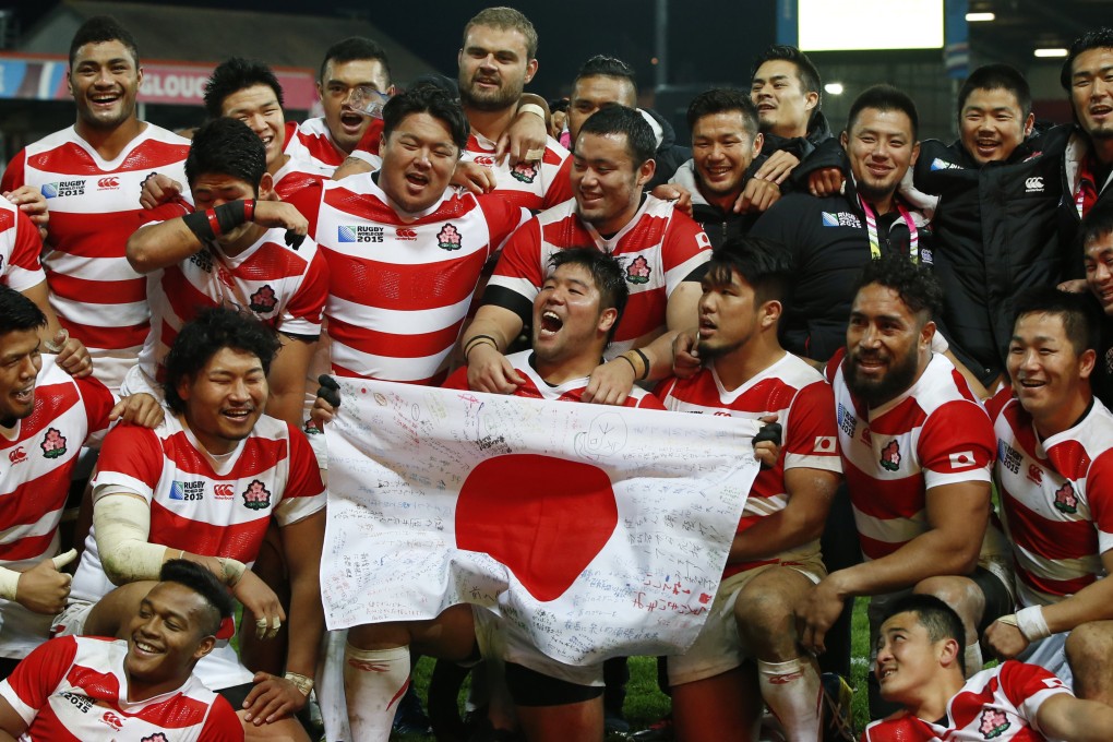 Japan celebrate after their victory. Photo: Reuters