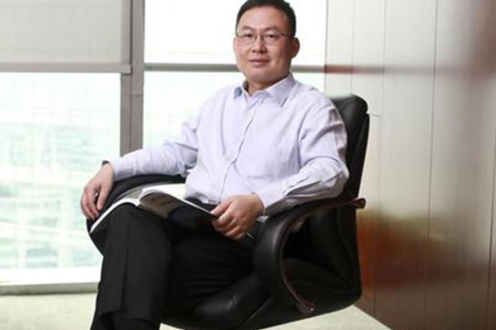 Xinyuan Real Estate chief financial officer George Liu says if the firm can issue onshore bonds they will cut funding costs. Photo: SCMP Pictures