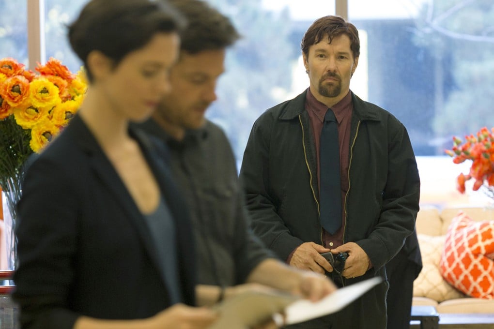 Joel Edgerton looks on in a still from the The Gift. Edgerton also wrote and directed the film (Category IIB).