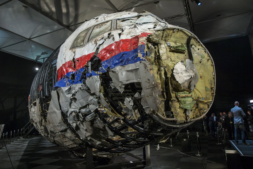 The reconstructed wreckage of Malaysia Airlines flight MH17 is shown after a presentation in the Netherlands on Tuesday of the final report into the crash that occurred on July 2014 over Ukraine. Photo: Reuters