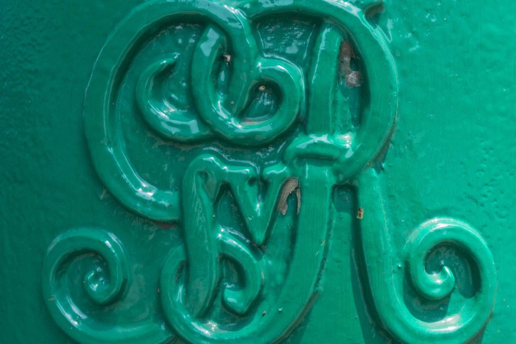 Continuing to display British royal insignia on some postboxes is inappropriate and could confuse people, Hongkong Post says.