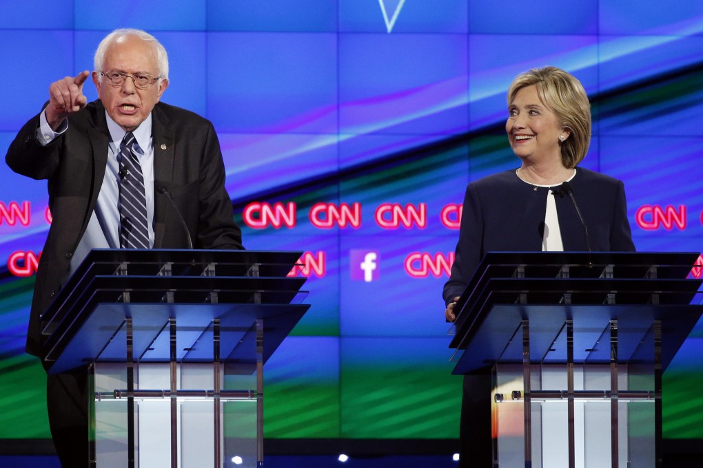 Bernie Sanders makes a point in the first Democratic debate of the campaign as a smiling Hillary Clinton looks on. The former secretary of state was tough, nimble and largely unruffled.Photo: AP