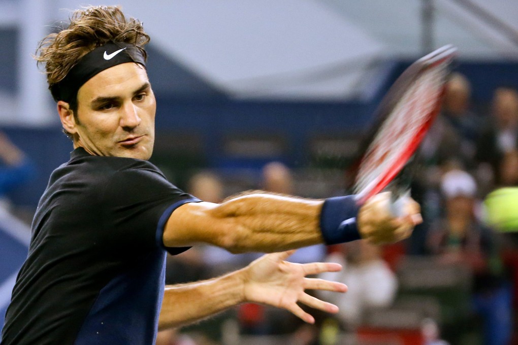 Roger Federer returns to Spain's Albert Ramos-Vinolas. Photo: AP