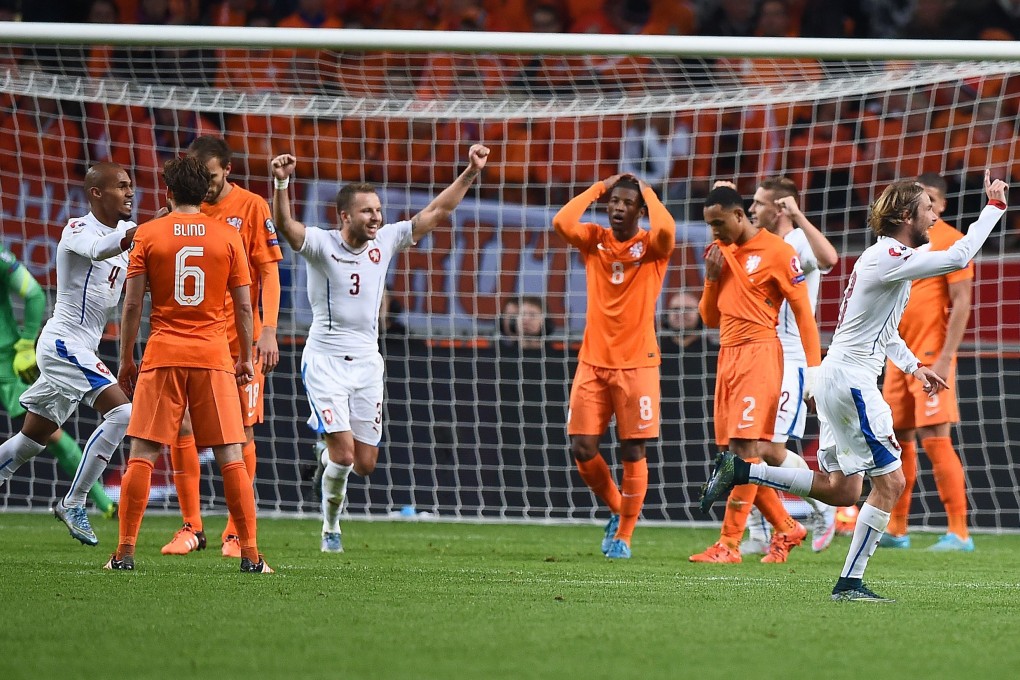 Czech Republic players celebrate their third goal against the Dutch. Photo: AFP