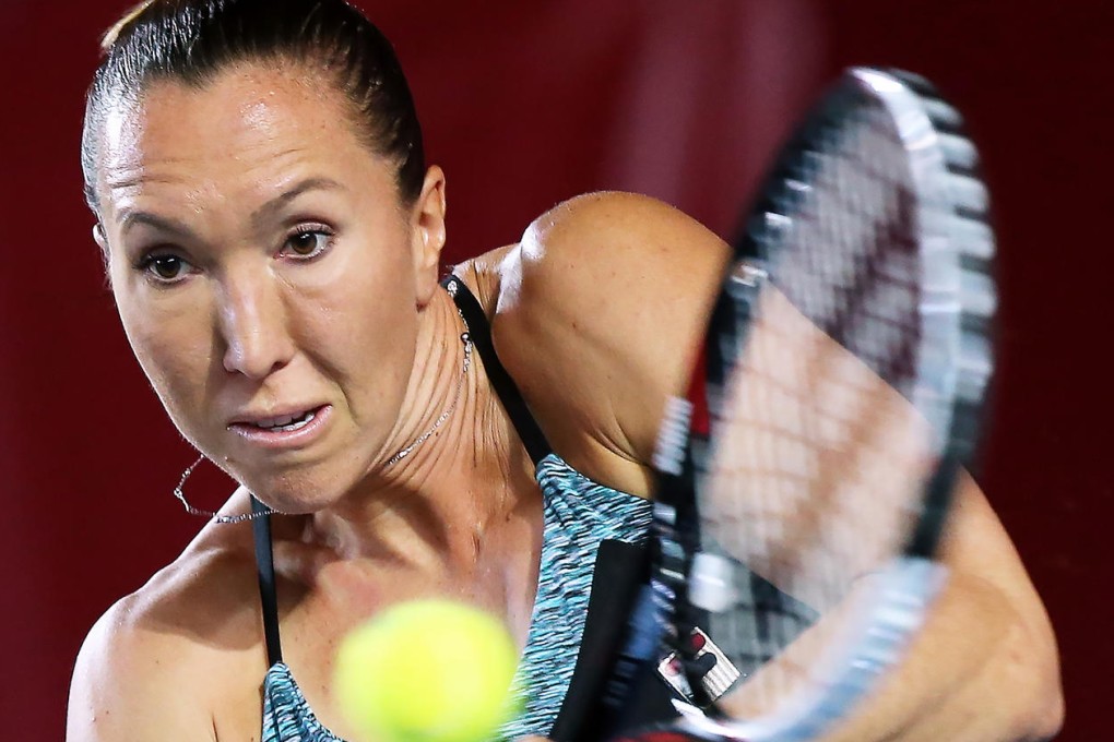 Jelena Jankovic of Serbia fires back a return to Australian opponent Anastasia Rodionova at the Prudential Hong Kong Tennis Open. Photos: K.Y. Cheng