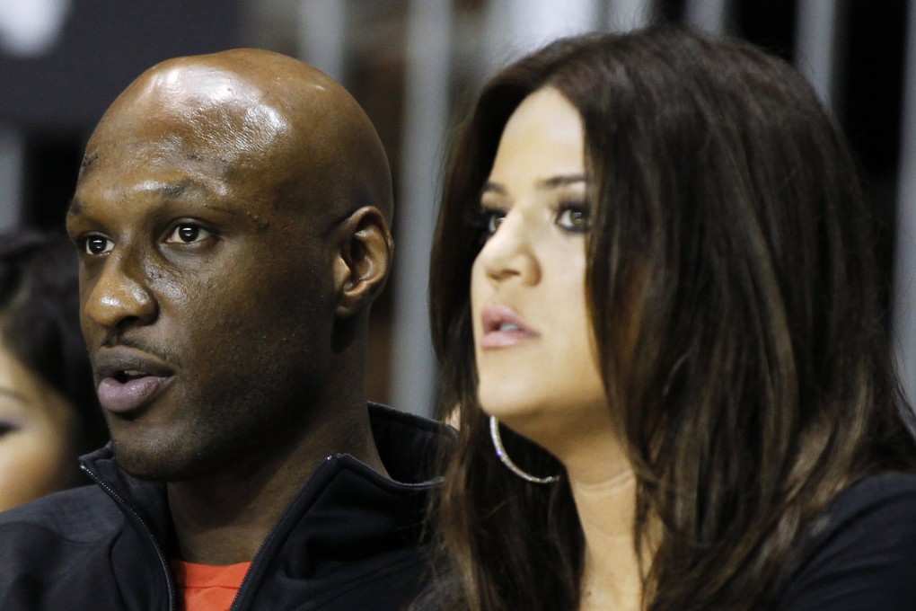 Lamar Odom with now-estranged wife Khloe Kardashian. Photo: Reuters