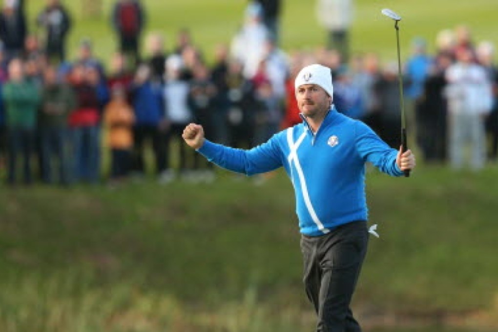 Graeme McDowell celebrates a victory at the 2014 Ryder Cup at Gleneagles. Photo: AP