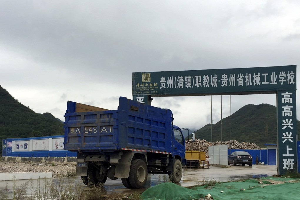 A truck arrives at a construction site at an industrial machinery school in Guizhou province in southern China. Photo: Reuters