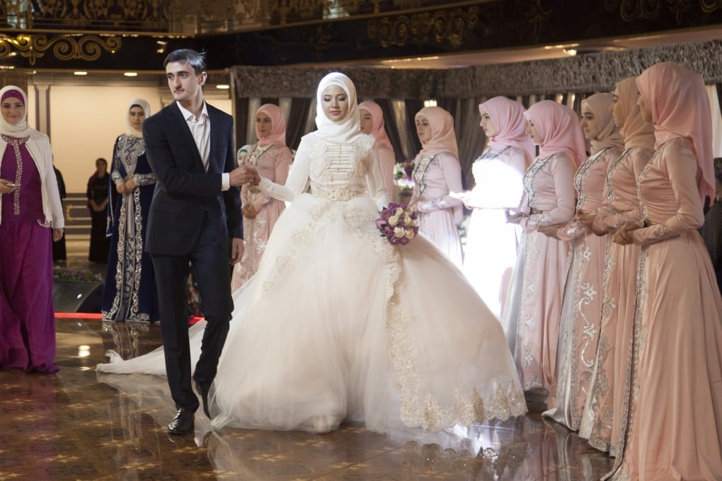 A Chechen bride dressed in national costume rests during a wedding ceremony in Grozny, Russia. Photos: AP