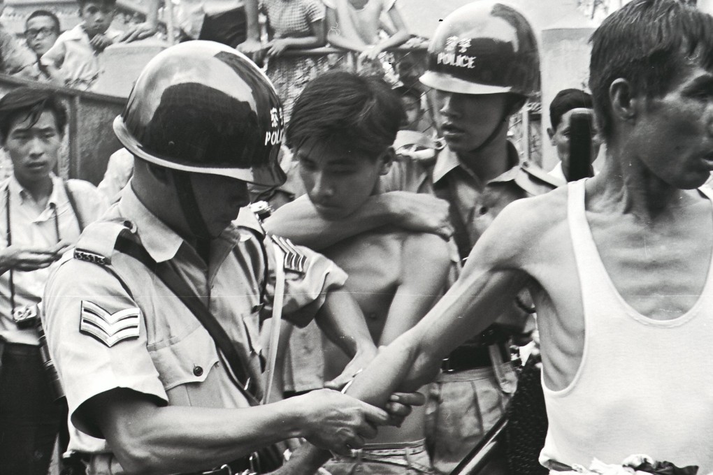 Police arrested two left-wing demonstrators during a clash in San Po Kong in 1967. Photo: SCMP Pictures