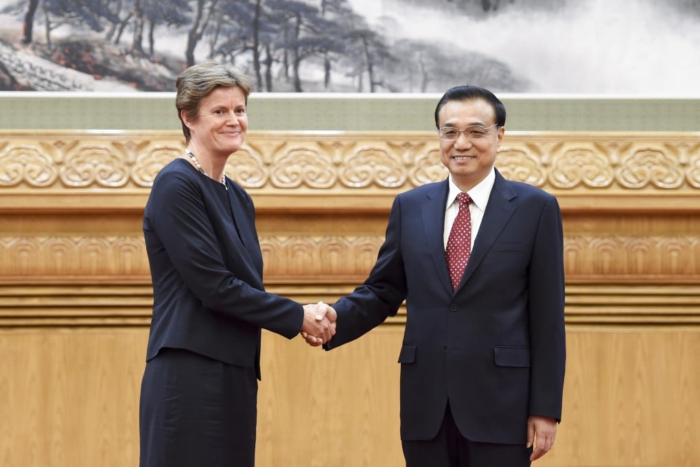 Premier Li Keqiang (right) shakes hands with Britain's envoy Barbara Woodward, in Beijing in September. Photo: Xinhua