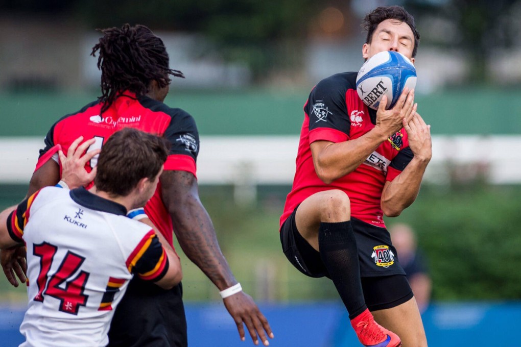 Valley's Reece Hamon collects a high ball in the clash against HKCC. Photos: HKRU