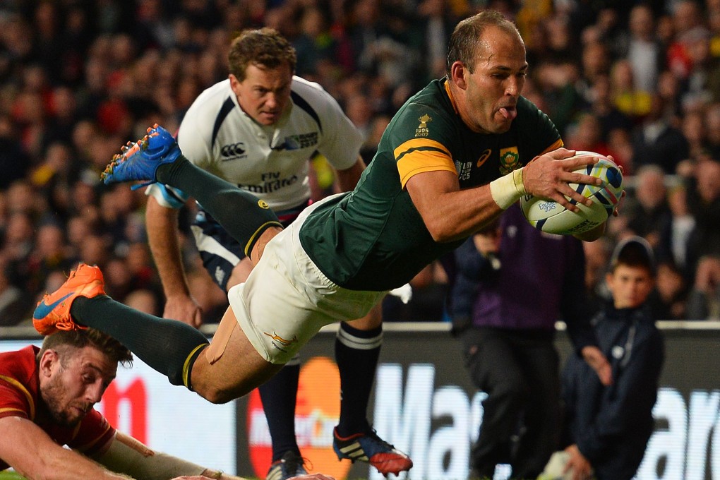 South Africa scrum-half and captain Fourie du Preez scores the match-winner against Wales in their Rugby World Cup quarter-final at Twickenham on Saturday. Photo: AFP
