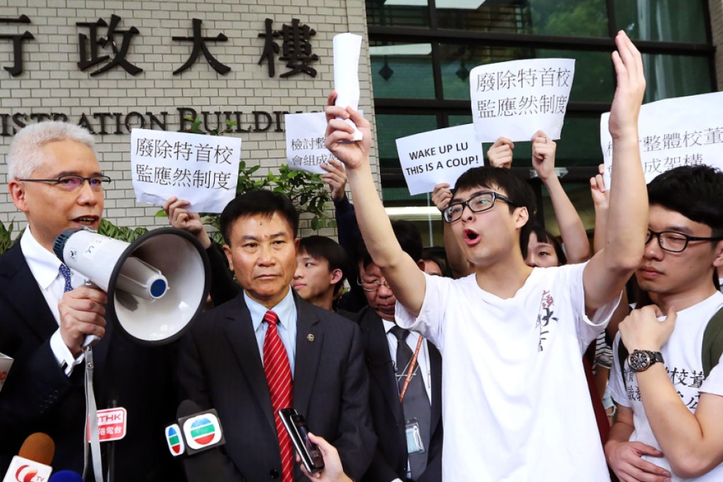 Lingnan University students express their anger before members of the governing council yesterday. Photo: Nora Tam