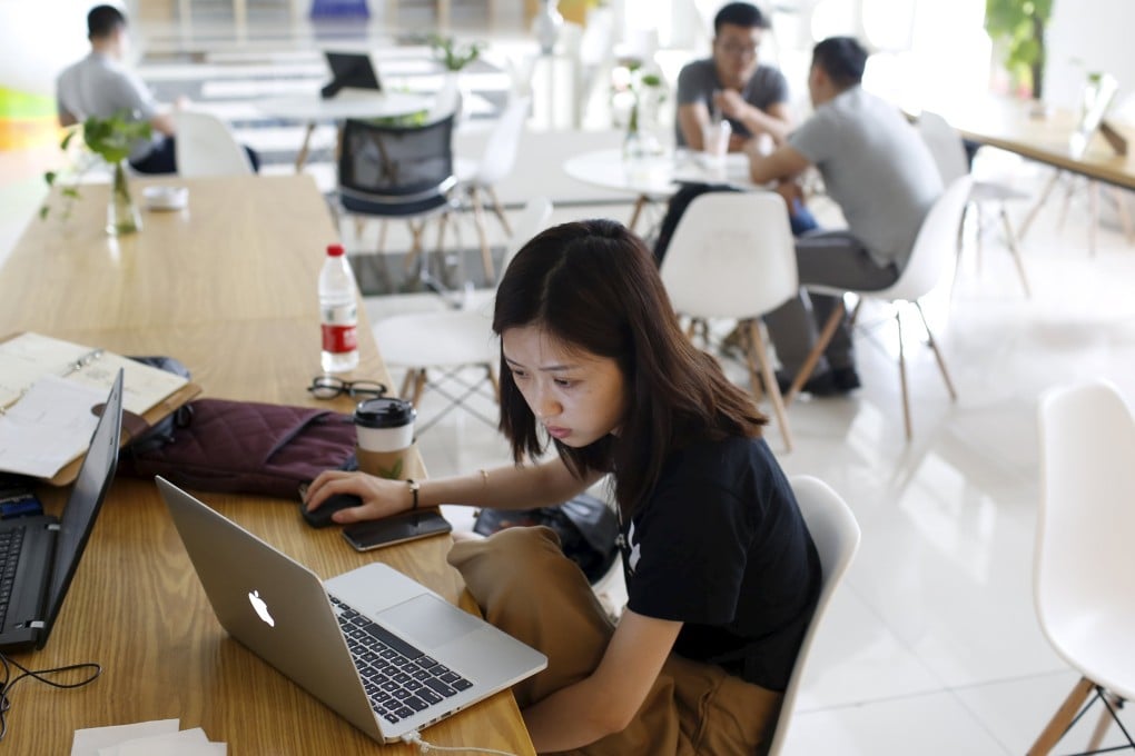 Young budding entrepreneurs look at their computers at a resting area inside the University Students Venture Park, which was designed as an incubator for university students keen to launch their own start-ups, in Shanghai. Photo: Reuters