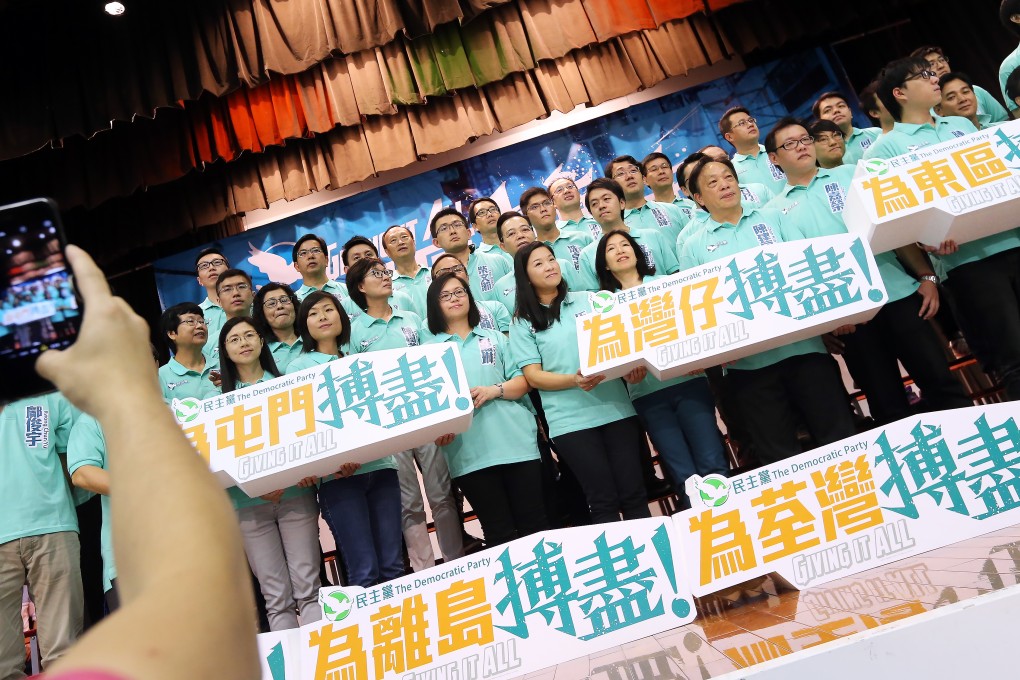 Democratic Party candidates line up at the Caritas Kowloon Community Centre. Photo: David Wong