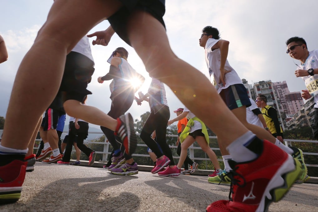 Runners compete in the in the annual Standard Chartered Hong Kong Marathon. Photo: Felix Wong