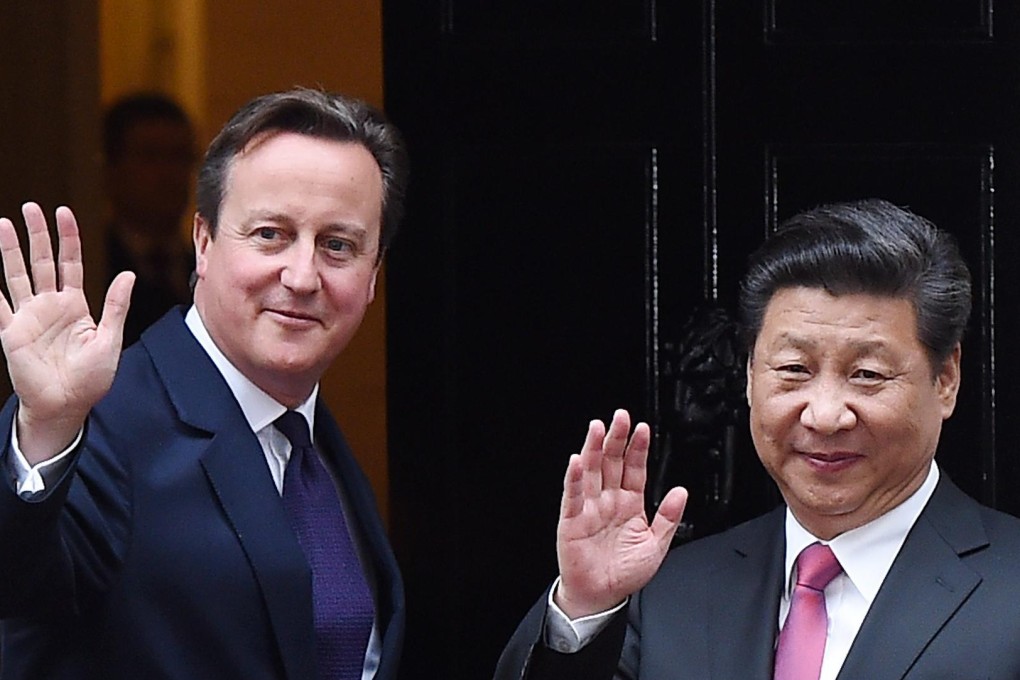 British Prime Minister David Cameron welcomes President Xi Jinping to 10 Downing Street yesterday.Photo: EPA