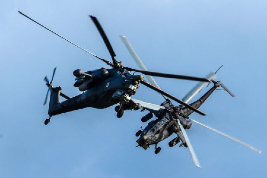 Russian Mi-28 military helicopters. Photo: EPA
