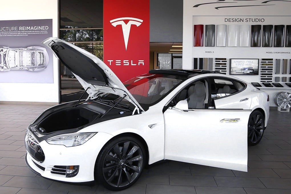 Owners of a Tesla Model S sedan reportedly complained of rattles, leaks and problems with the charging equipment, drivetrain and centre console displays, yet almost all said they would buy another Model S. Photo: AFP