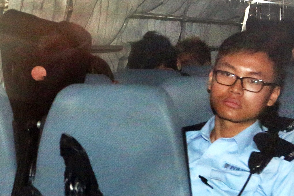 The suspects are escorted to court. Photo: Edward Wong