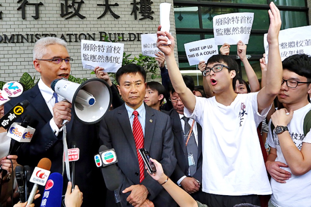 Lingnan University Student Union surround the venue of a meeting of the school's governing council to stage a protest against the appointment of five new council members by chief executive Leung Chun-ying. Photo: Nora Tam