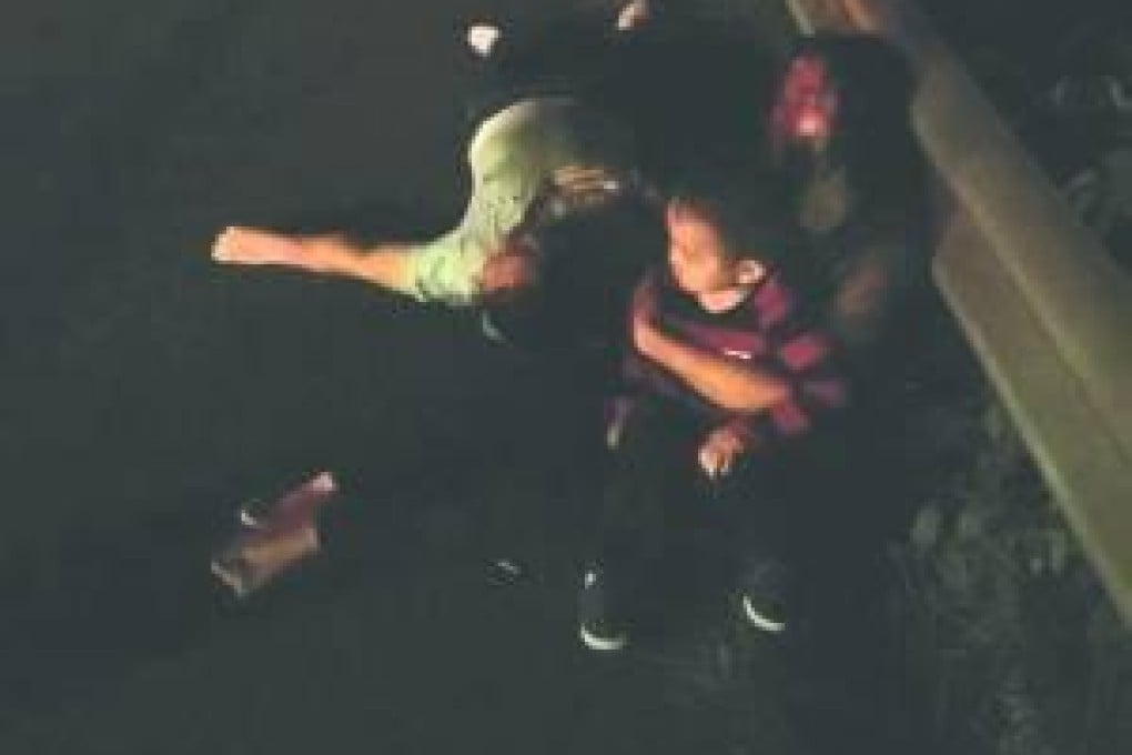 Victims of the crash in Changzhou shown lying at the side of the road. Photo: Sina.com