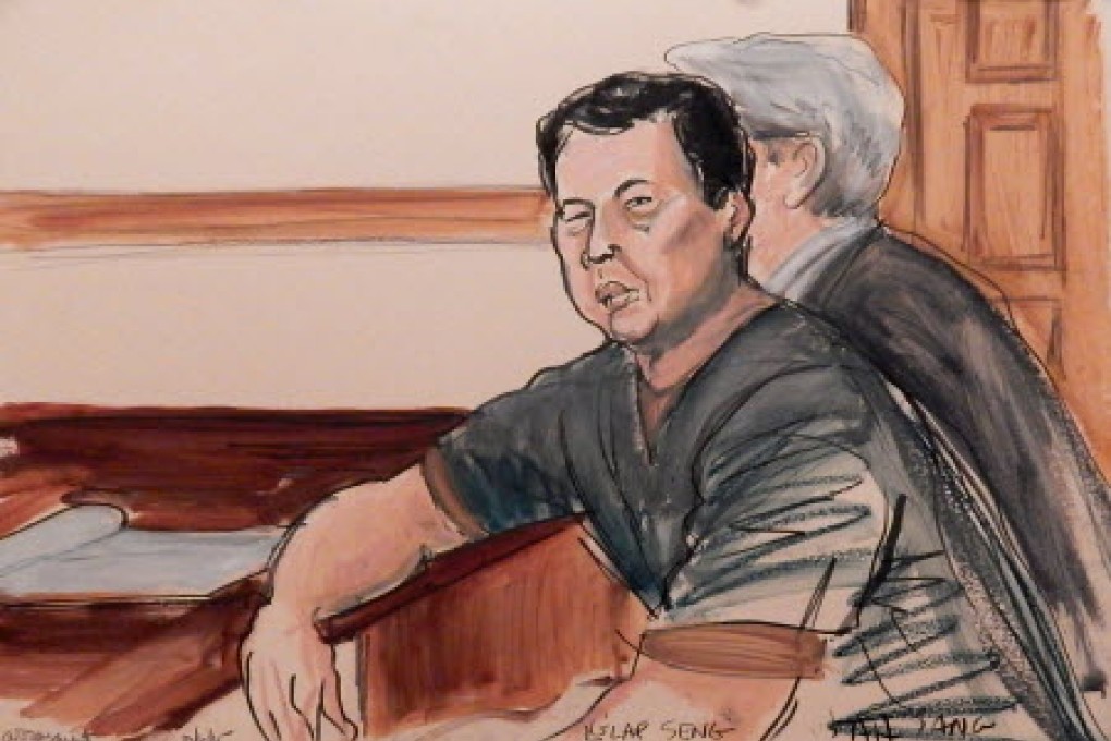 Th this courtroom sketch, defendant Ng Lap Seng is seated in court at the defense table with his attorney during his arraignment on bribery charges. Photo: AP