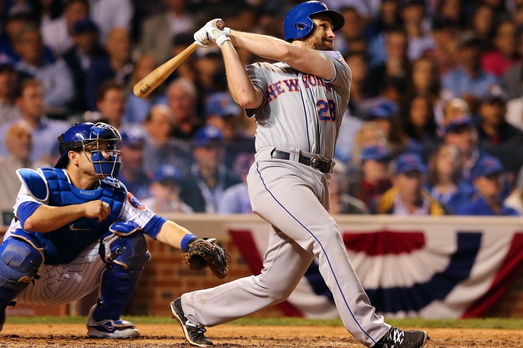 Daniel Murphy of the New York Mets hits a two run home run against the Chicago Cubs during game four of the 2015 MLB National League Championship Series at Wrigley Field. Photos: AFP