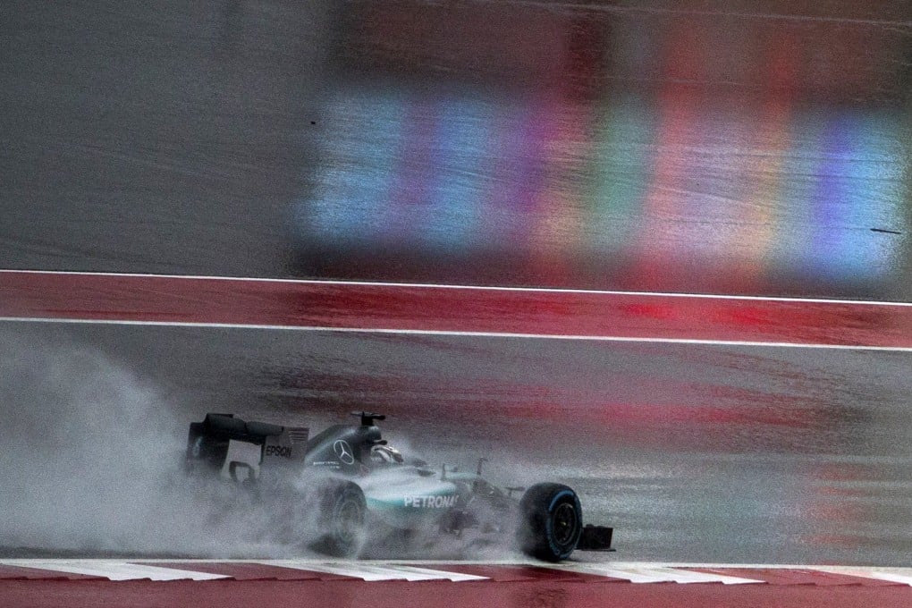 Lewis Hamilton in action in the driving rain. Photo: Reuters