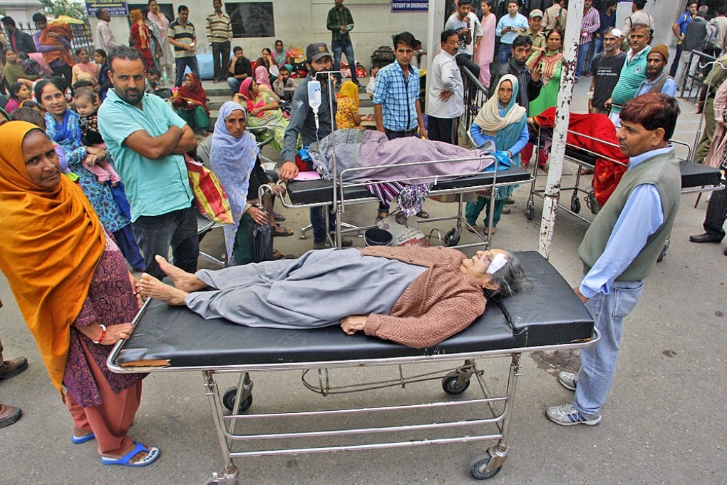 Patients were shifted outdoors at the government medical college hospital after a 7.5 magnitude quake sent tremors across South Asia. Photo: AP