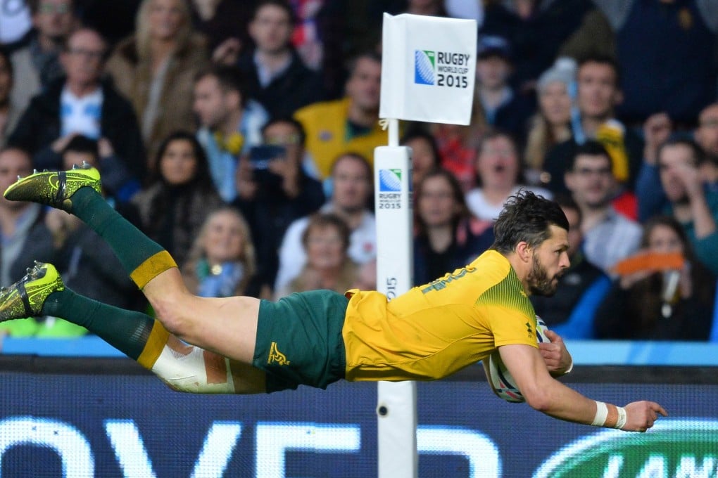 Adam Ashley-Cooper scores Australia’s third try in their World Cup semi-final clash against Argentina at Twickenham. The winger scored a hat-trick of tries as the Wallabies won 29-15. Photo: AFP