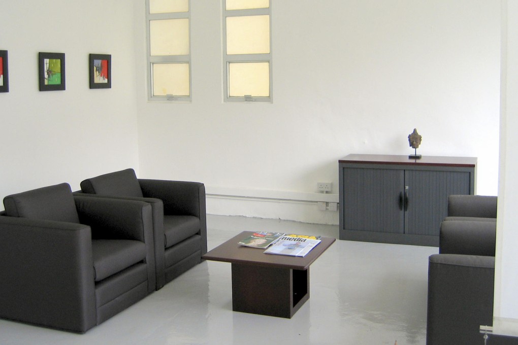 Before and after: the natural light of an ex-factory used to good effect in a client waiting room. Photos: Courtesy of Chris Dillon