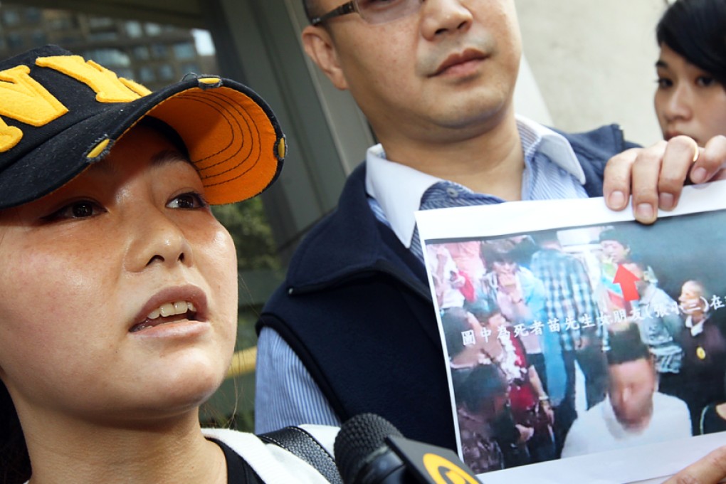 Deng Haiyan outside Hung Hom police station where she reported that the beating had left her deaf in her right ear. Photo: SCMP Pictures