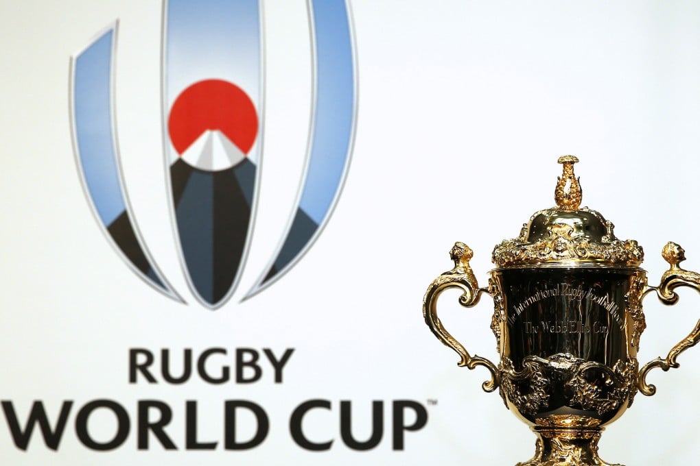 The logo next to the trophy. Photo: AFP