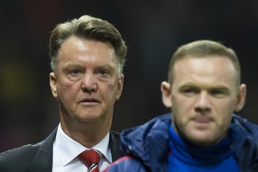 Louis van Gaal and Wayne Rooney, who missed from the spot. Photo: AP