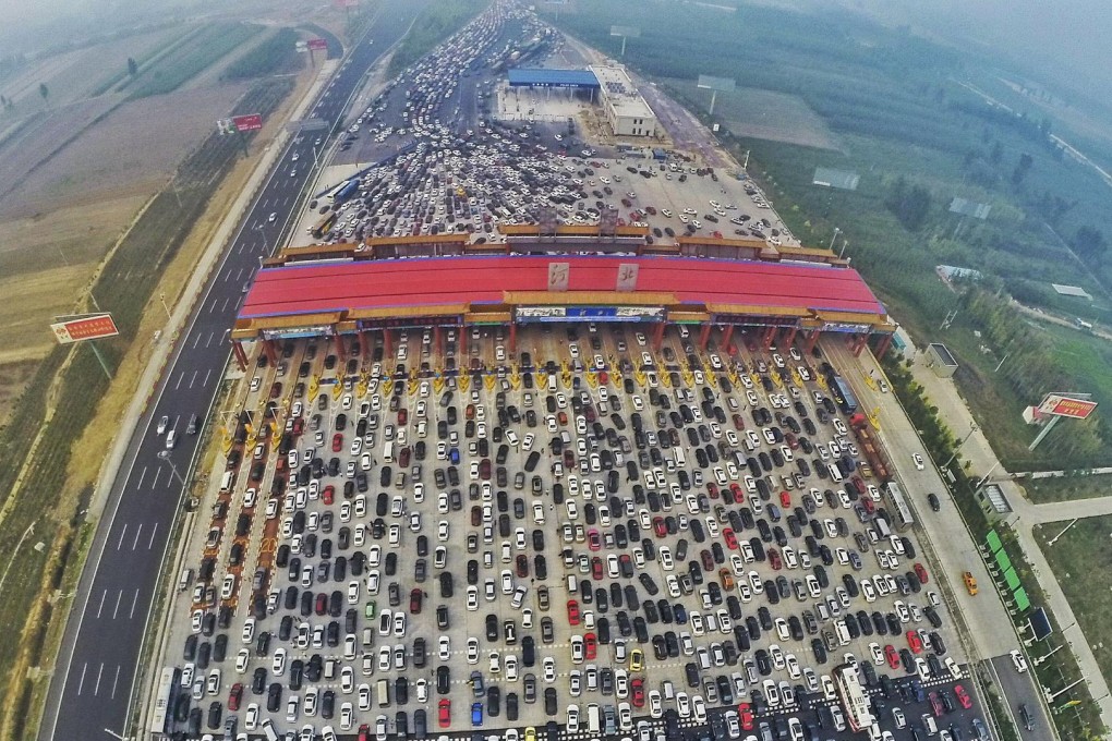 A traffic jam to end all traffic jams near a toll station in Beijing last month. Photo: Reuters