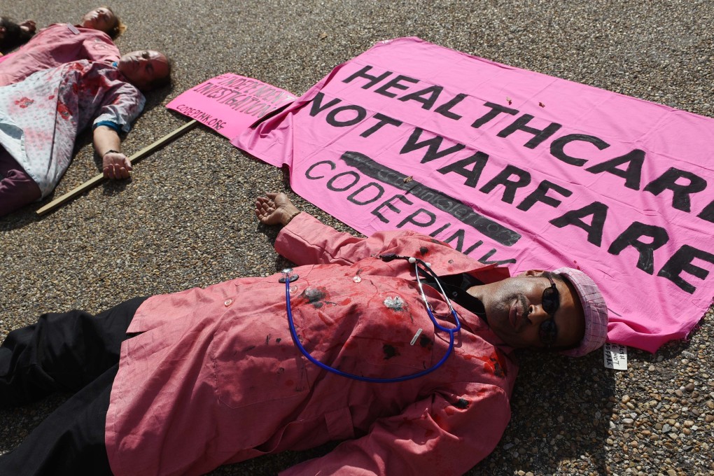 Protesters take part in a demonstration against the US air strike in the Afghan city of Kunduz, in front of the White House. Photo: AFP
