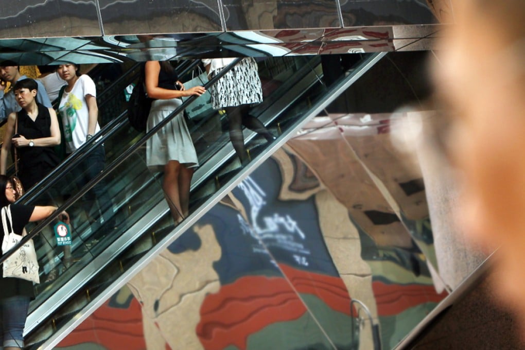 Upskirt photos happen most often on ascending escalators, where offenders stand behind the victim on the steps, police data shows. Photo: Sam Tsang