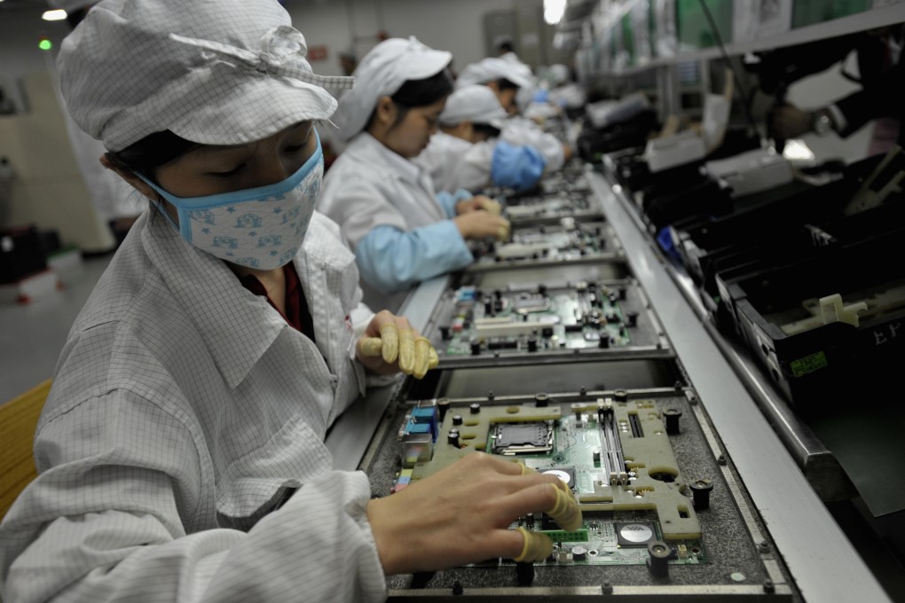 Taiwanese high-tech manufacturers have been hit by falling demand from mainland China. Exports from the island fell 14 per cent in September. Photo: AFP