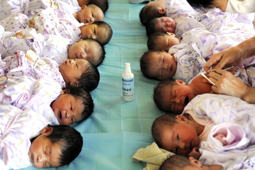 Newborns receive vaccines in a hospital in China. Photo: Reuters