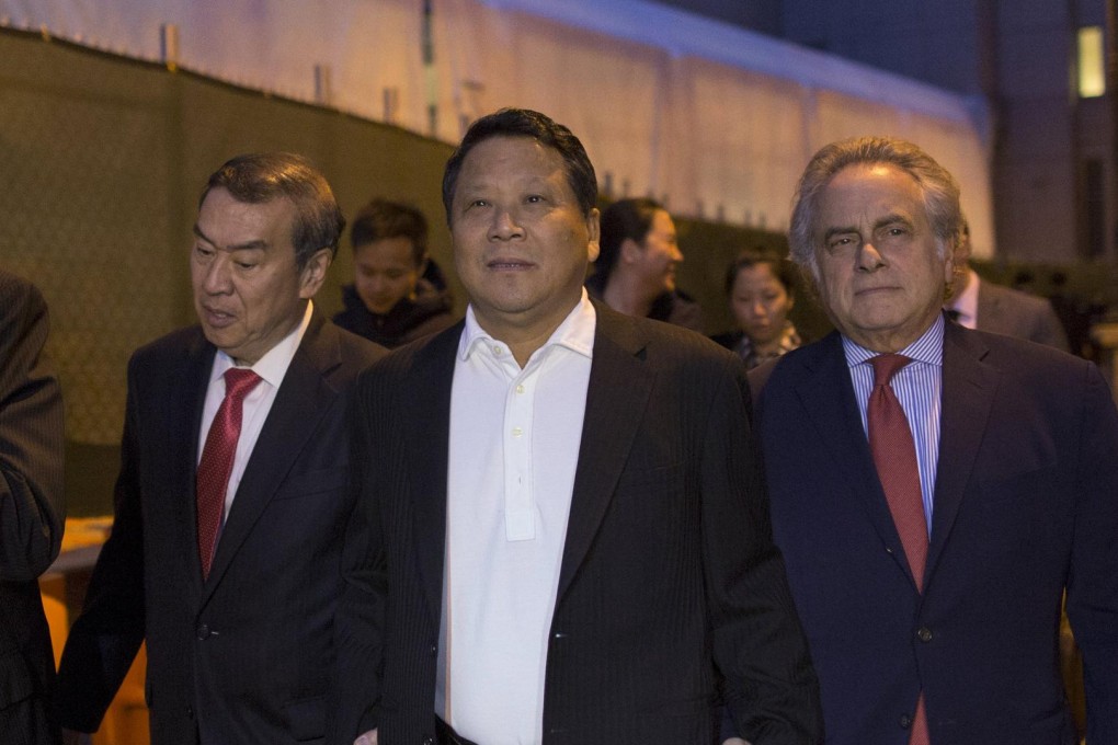 Ng Lap-seng (centre)