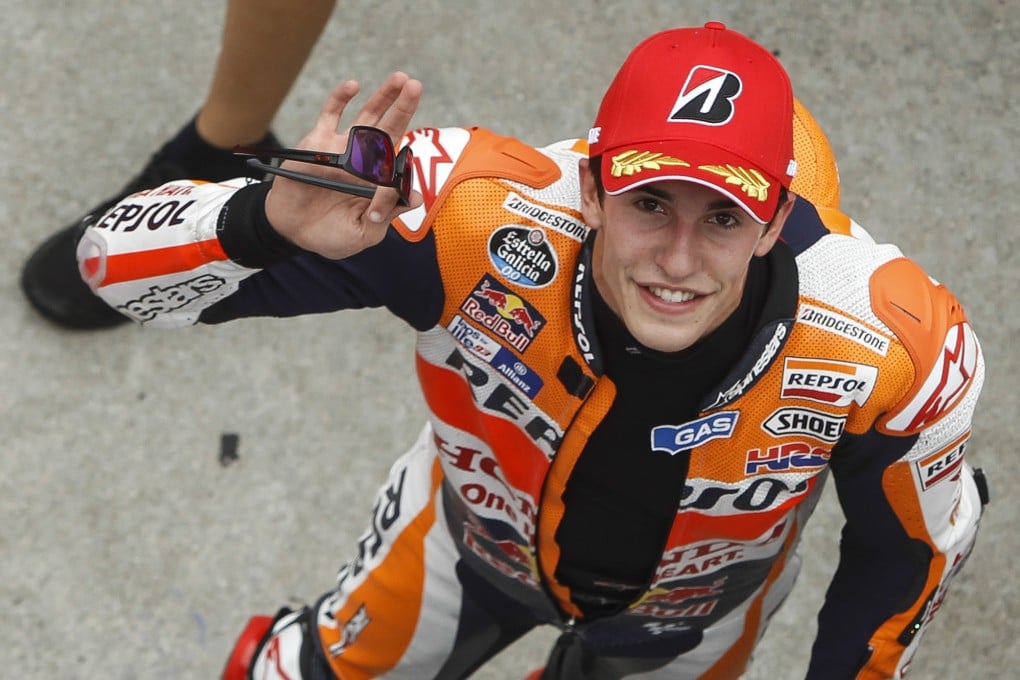 MotoGP rider Marc Marquez of Spain waves at photographers in Sepang, Malaysia. Photo: AP