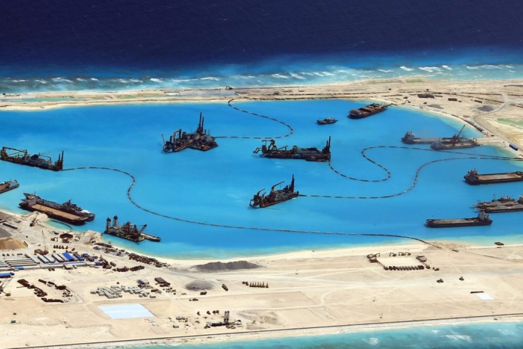 Chinese work on Yongshu, or Fiery Cross Reef, in the Spratly Islands. China and the Philippines are among a number of countries involved in territorial disputes over these and other islands in the South China Sea. Photo: SCMP Pictures