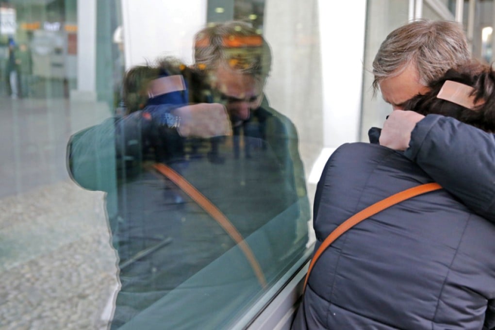 Relatives of passengers of Kogalymavia 9268 weep at Pulkovo II international airport in St. Petersburg, Russia. Photo: EPA