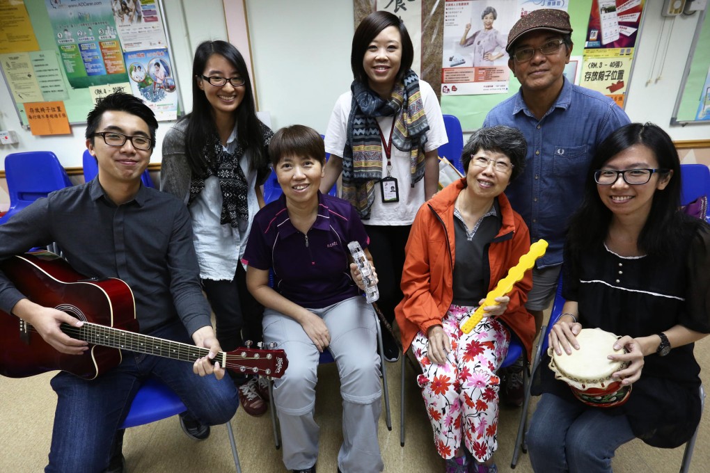 Music therapist Kingman Chung (front left) with colleagues and stroke survivors at a rehabilitation centre in Quarry Bay.Photo: Jonathan Wong