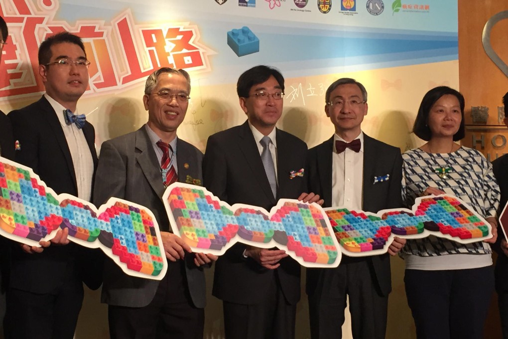 Health minister Dr Ko Wing-man (centre) attends an event yesterday to promote awareness of prostate cancer. Photo: Naomi Ng