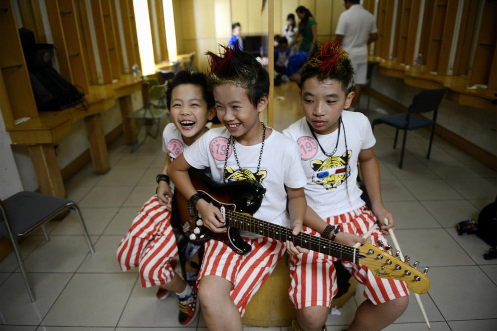 Giving children ownership of their music tastes will increase their interest. Photo: AFP