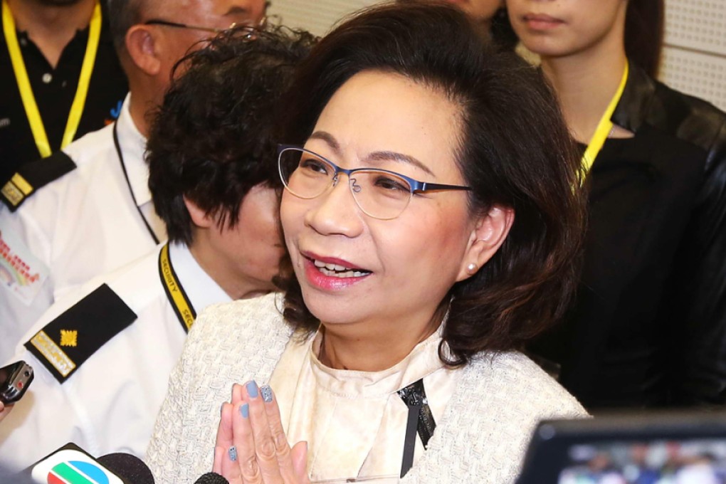 Regina Leung Tong Ching-yee, wife of Hong Kong Chief Executive Leung Chun-ying, responds to a weekend drama that saw her photographed being slapped twice in the face on a Central street. Photo: SCMP Pictures