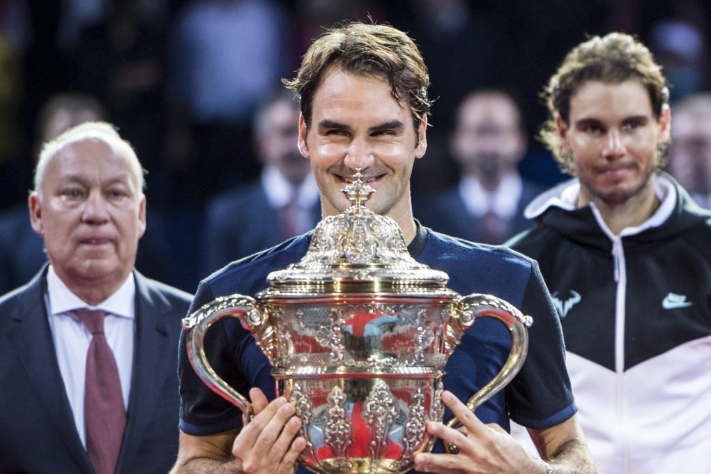 Switzerland's Roger Federer  celebrates after beating Spain's Rafael Nadal in the Swiss Indoors final. Photo: EPA